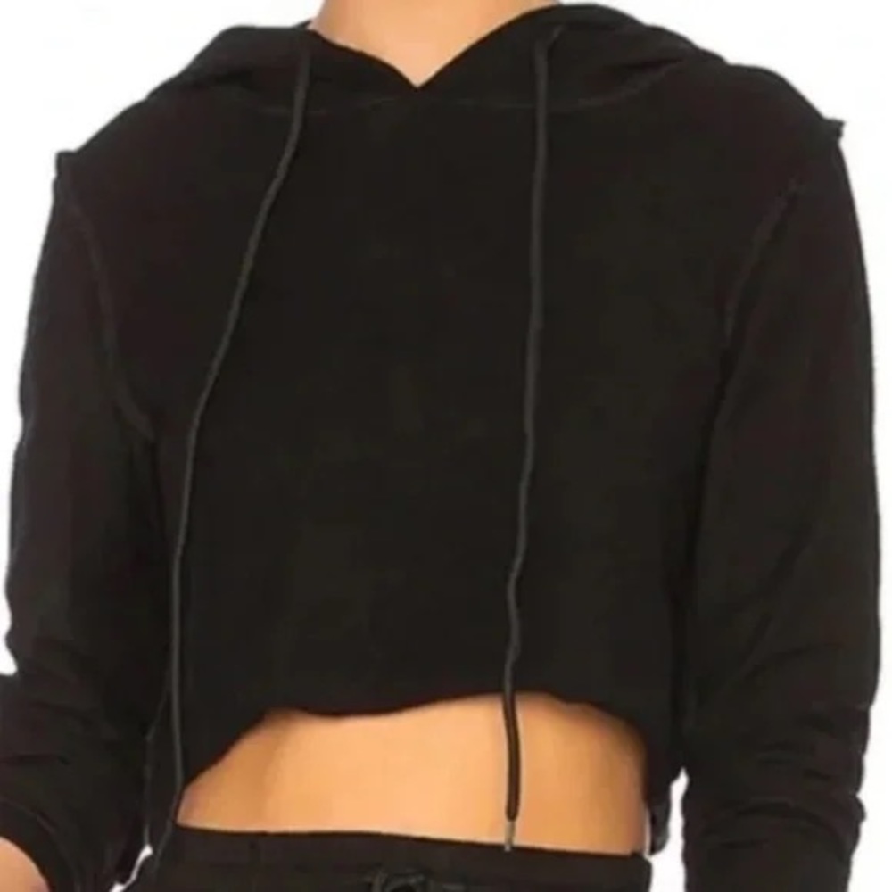 Danielle Guizio cropped inside-out black hooded sweatshirt.